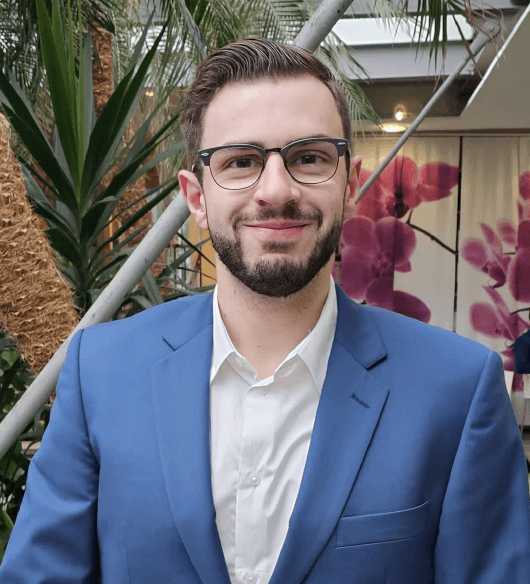Profilbild von Wanja Herkt - IT-Consultant und Cloud-Architect mit freundlichem Lächeln
